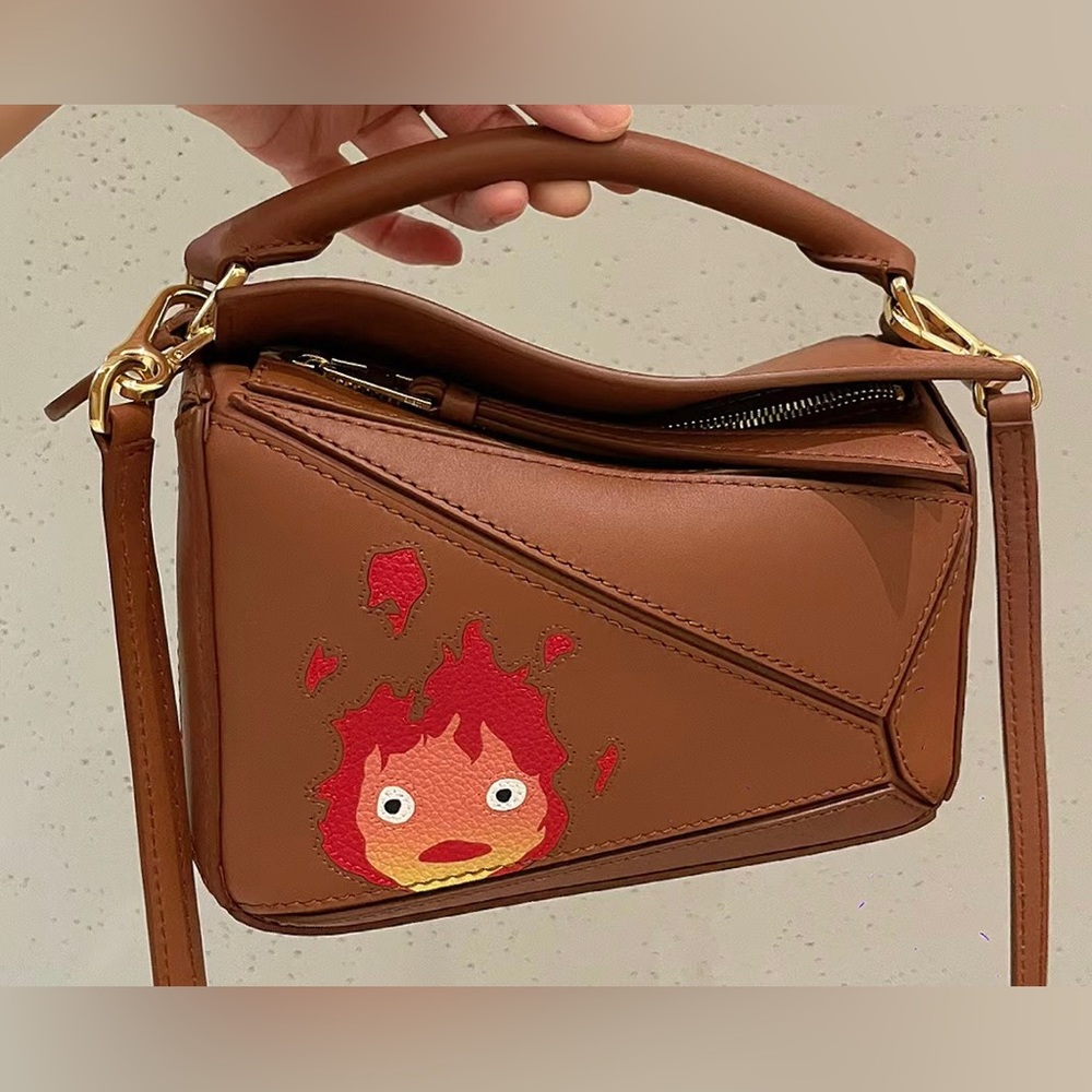 Loewe Howl's Moving Catsle mini puzzle brown/rust NWT